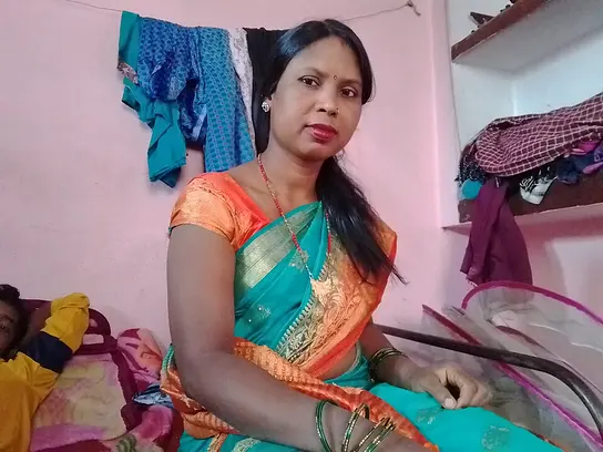 Watch this mature Indian granny get down and dirty with her son's friend in retro action
